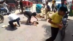 Passersby Loot Liquor After Boxes Fall Off Tempo During Transport In UP's Agra: Video Goes Viral
