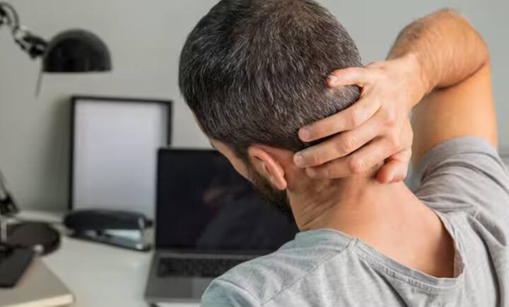 Shoulder and arm pain: The pain may spread from the neck to the shoulder and arm. It may also cause weakness or tingling in the arms.