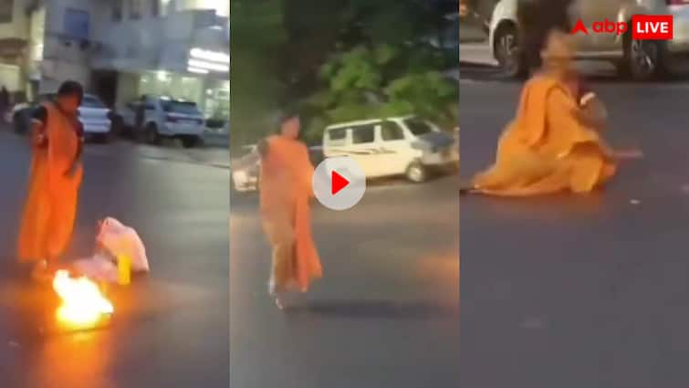 woman did black magic at the main circle on road in jabalpur video goes viral Viral Video: खौफनाक मंजर! बाल खोलकर बीच सड़क में जादू-टोना करने लगी महिला, देखने वालों के बीच फैली दहशत