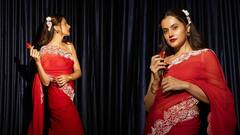 Taapsee: ఎర్ర చీర కట్టుకొని, రెడ్ రోజ్ పట్టుకుని- ఆకట్టుకుంటున్న సొట్టబుగ్గల సుందరి