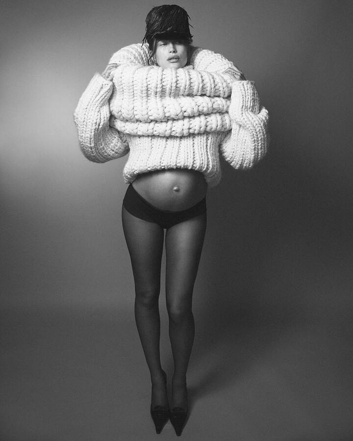 She also donned a linen minidress, an oversized fur coat, a sheer cut-out dress, an oversized jumper and more.