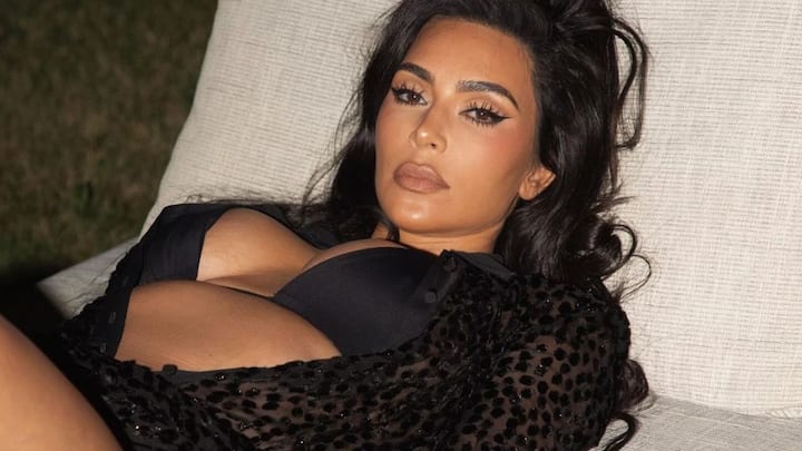 Kim Kardashian's latest pictures can be your ideal outfit for a beach vacation or a pool party. Check out her sizzling look in a black bikini.