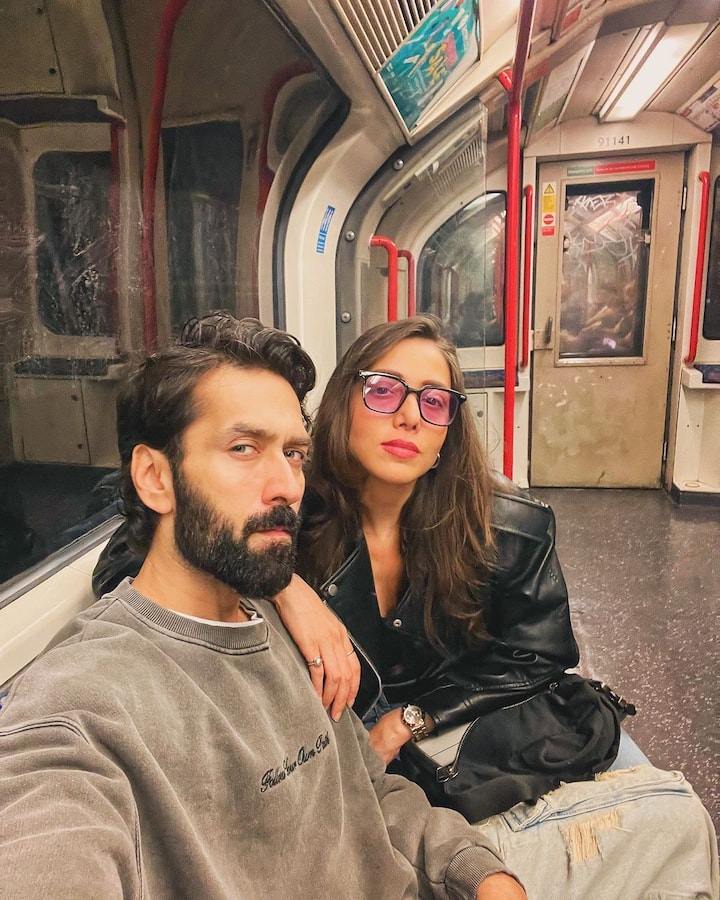 One of the photos shows them seated in a metro.