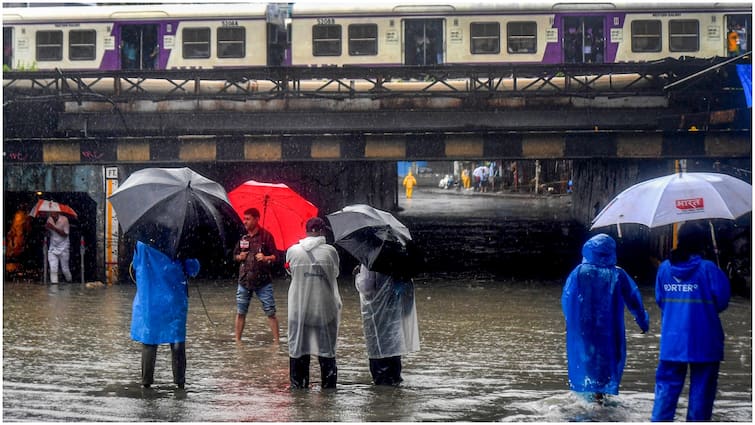 Mumbai IMD Red Alert Heavy Rain Policer ask-people-to-stay-indoor Lakes Overflow waterlogging Mumbai On 'Red Alert' As Rain Fury Continues, Cops Ask People To 'Stay Indoors'