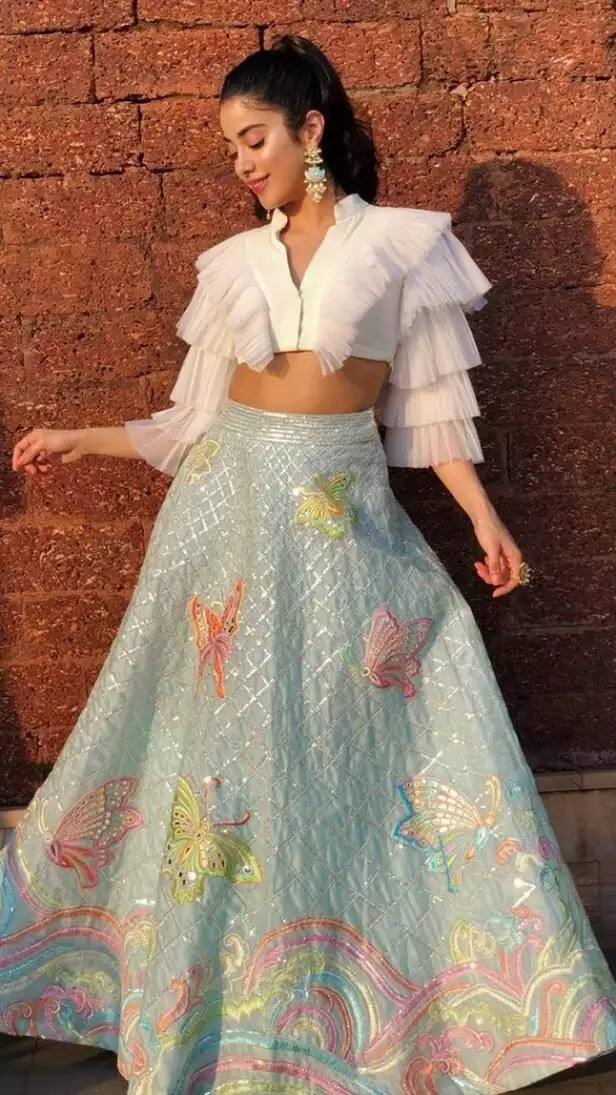 Janhvi Kapoor: Janhvi stuns in an ice blue skirt that has gorgeous butterfly prints in it, paired with a simple white top. She looks elegant and charming, resembling a real-life princess of the current generation. (Image Source: Special Arrangement)