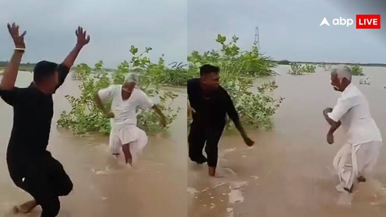 gujrat father son duo dance beautifully in rain video gets viral on social media गुजरात में बारिश के दौरान पिता ने बेटे के साथ किया गजब का डांस, वीडियो हुआ वायरल