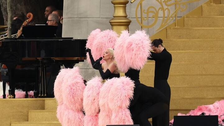 Lady Gaga stunned at the opening ceremony of the 2024 Olympics with a breathtaking feathery performance and an all-Dior ensemble.