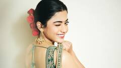 Rashmika Mandanna : రెట్రో లుక్​లో రష్మిక మందన్నా.. పచ్చని చీరలో, ఎర్ర గులాబీలతో క్యూట్​గా ఉంది కదూ
