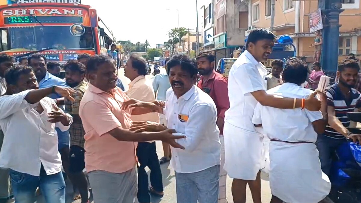 மயிலாடுதுறை : பேரூராட்சி தலைவரை முற்றுகையிட்ட அதிமுகவினர் : ஆட்டோவில் மீட்டுச்சென்ற கணவர்