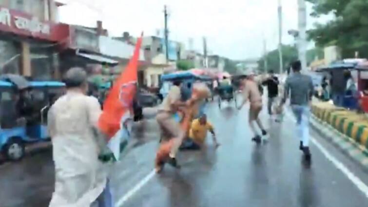 UP Congress Workers Try To Burn Anurag Thakur Effigy During Protest In Sitapur Cops Run Away With It video Congress Workers Try To Burn Anurag Thakur's Effigy During Protest In Sitapur, Cops Run Away With It: WATCH