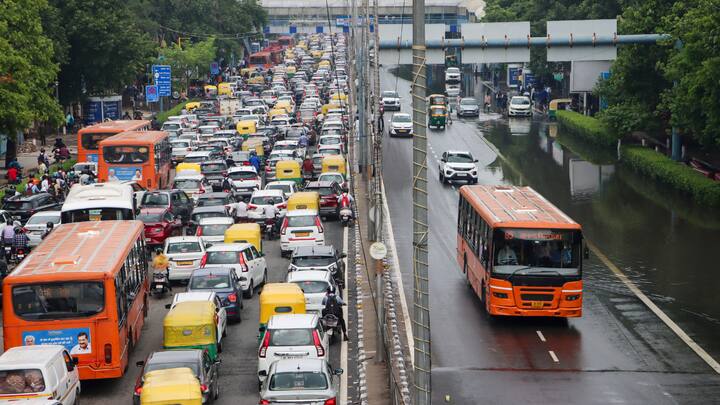 Vehicles stuck in traffic jam after rains, in New Delhi as heavy rainfall lash the city on Wednesday. (Photo: PTI)