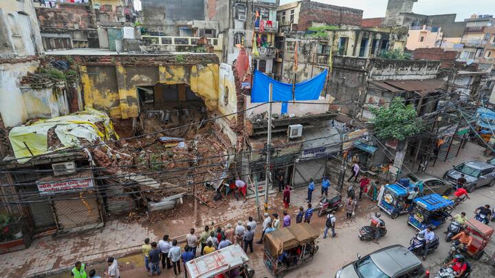 A house collapsed in the Sabzi Mandi area following heavy rainfall in the national capital. (Photo: PTI)