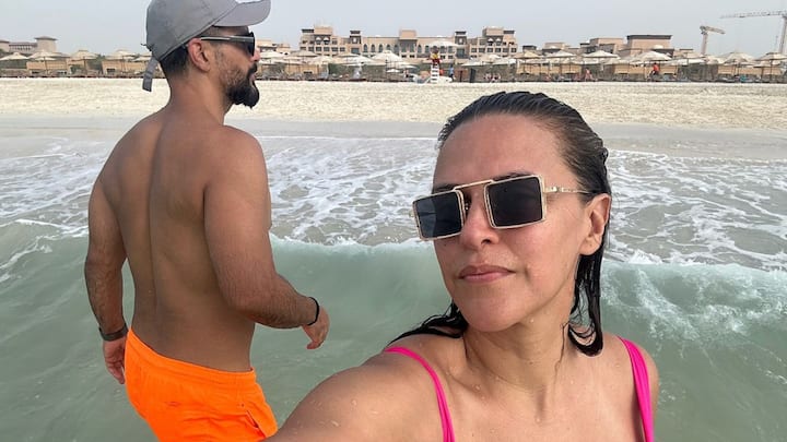 Neha Dhupia treated fans with pictures from her summer beach break with her family.