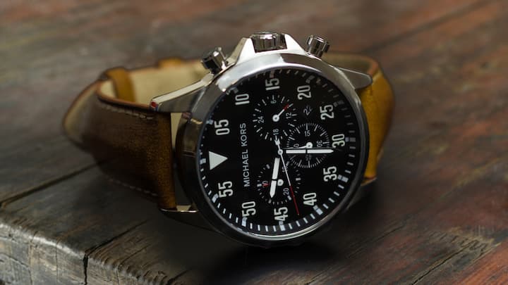 Watch: Watches are and always will be in fashion. Many Pinterest mood boards are filled up with numerous types of watches. Be it old money style thin strap watches for women or classic big dial watches for men, it will show a sense of effort made to look good. A sleek watch can elevate even the simplest outfit and add a touch of sophistication. A casual basic t-shirt and jeans can easily be lifted up by wearing a watch. Smart watches are also in fashion these days, although they do not go with every outfit you own in the wardrobe. It can be styled for casual outings. Watches are a timeless accessory that never goes out of style. You can even grab your mother's or father's watch as a vintage watch and create a style statement for your outfit. (Image source: Canva)