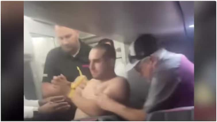 On Cam: US Man, High On Cannabis, Strips On Plane, Tries To Open Emergency Door Mid-Air On Cam: US Man, High On Cannabis, Strips On Plane, Tries To Open Emergency Door Mid-Air