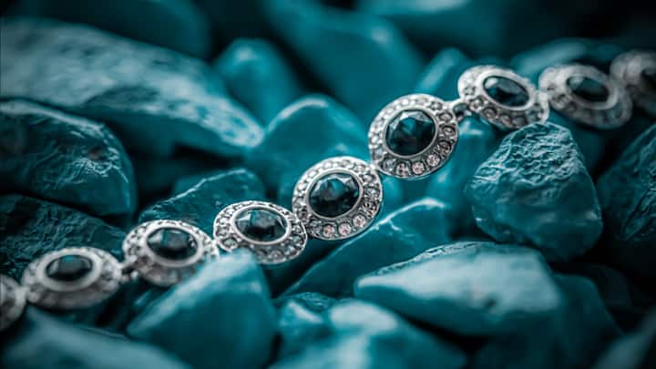 Schedule periodic professional cleaning services, especially for intricate pieces, as trained jewellers possess the expertise and tools to safely remove tarnishes and restore the original shine.  (Image Source: Canva)