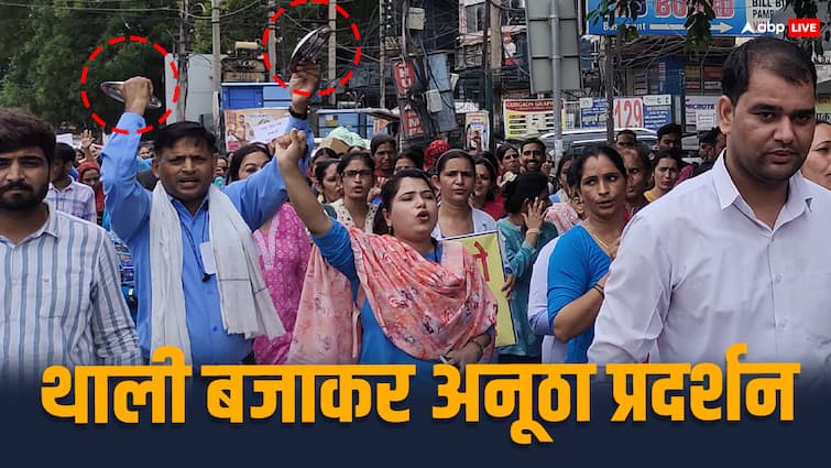 Haryana NHM Employees Strike going on 12th day Protest by clapping in Gurugram ANN हरियाणा में NHM कर्मचारियों की हड़ताल जारी, 12वें दिन गुरुग्राम में थाली बजाकर किया प्रदर्शन