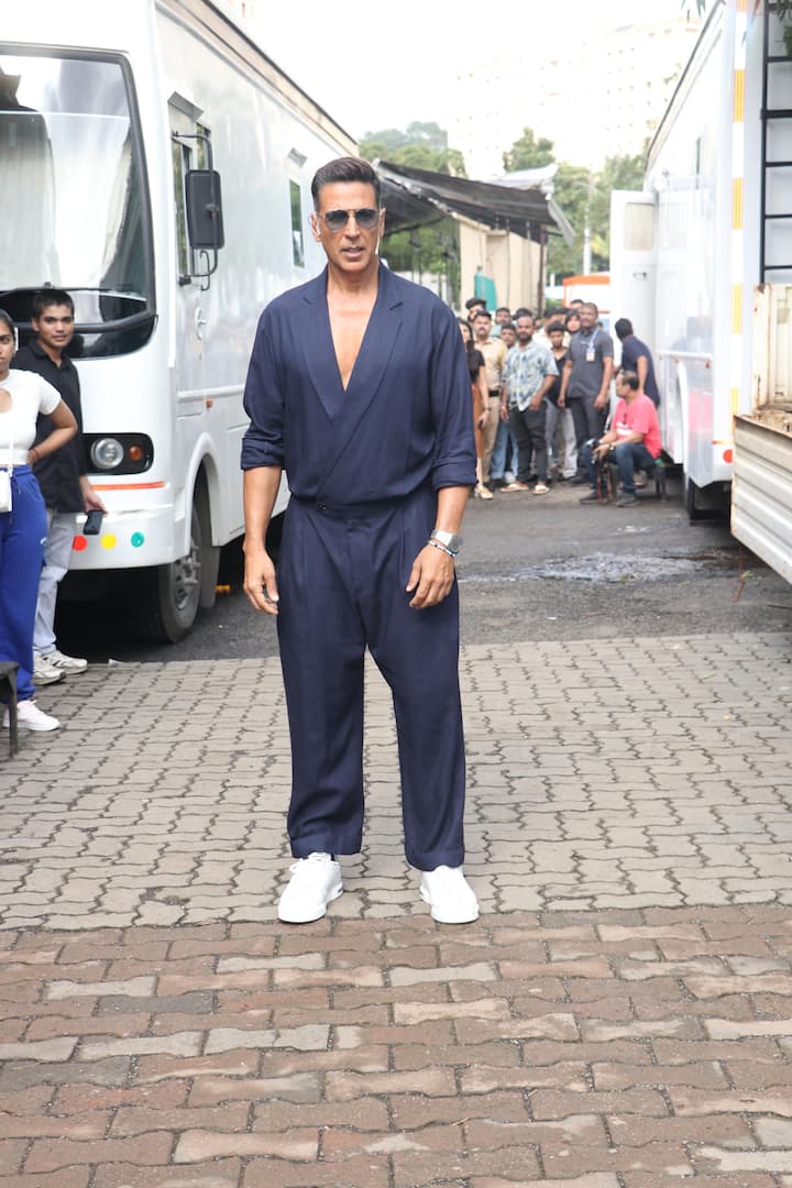 Akshay Kumar wore a blue overall paired with white sneakers.