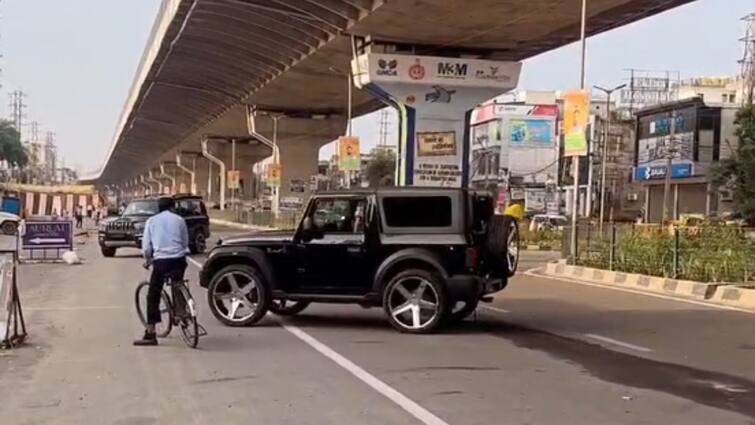 Gurugram young men doing stunt sitting in thar video goes viral ANN गुरुग्राम में बिगड़ैल युवाओं की स्टंटबाजी का वीडियो वायरल, बाल-बाल बची साइकिल सवार की जान