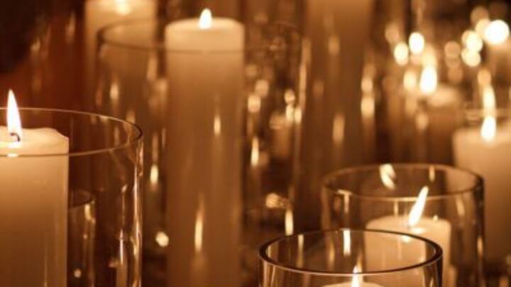 Light A Candle Or Diya: Lighting candles or diyas activates the fire element, which is a powerful symbol of energy and transformation. To fully harness their potential, place them in the southeast direction of your home, as this area corresponds to the fire element. This strategic placement can help ignite passion, boost motivation, and enhance clarity in your life. Additionally, the warm glow and flickering light of candles or diyas contribute to a vibrant and uplifting aura, enriching the overall atmosphere of your space. (Image Source: Pinterest/ Style Me Pretty)
