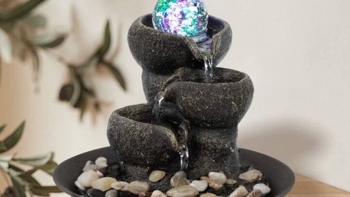 Enhance The Heart Of Your Home: The center of your home, often referred to as the Brahmasthan, is essential for maintaining balanced energy throughout your living space. To optimize this area, ensure it is kept clean and free of clutter. Introducing elements such as a small water fountain, which symbolizes the flow of positive energy, or placing fresh flowers can invigorate the space and enhance its vibrancy. By focusing on the heart of your home, you create a harmonious environment that supports overall well-being and tranquility. (Image Source: Pinterest/ Corina Tennies)