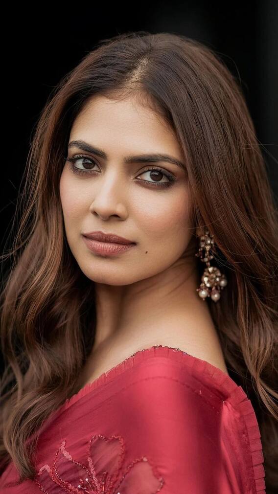 Malavika Mohanan Paints The Town Red For Thangalaan Promotions