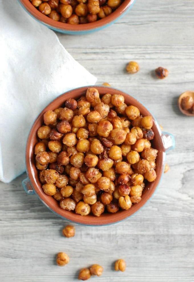 Roasted Chickpeas: This is the best and most affordable source of protein for everyone, especially if you are vegan. Roasted chickpeas have around 7g of protein and 4g of fiber in 30g. Roasted chickpeas are also a rich source of soluble and insoluble fiber. They can be coated in a variety of flavors and are very easy to carry around. (Image source: Pinterest/A Cedar Spoon)