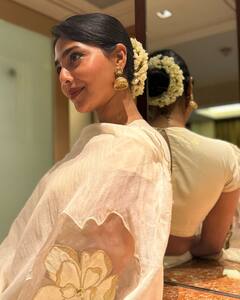 Aishwarya Lekshmi Photos : மதுரை மீனாட்சியம்மன் கோயிலில் பொன்னியின் செல்வன் பூங்குழலி!