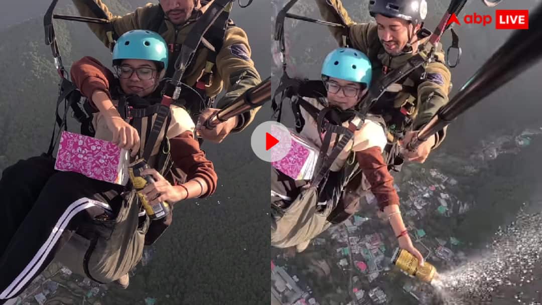Girl celebrating her birthday while paragliding open beer can video goes viral on social media पैराग्लाइडिंग करते हुए लड़की ने हवा में खोली बीयर की कैन, सैकड़ों फीट की ऊंचाई पर मनाया बर्थडे