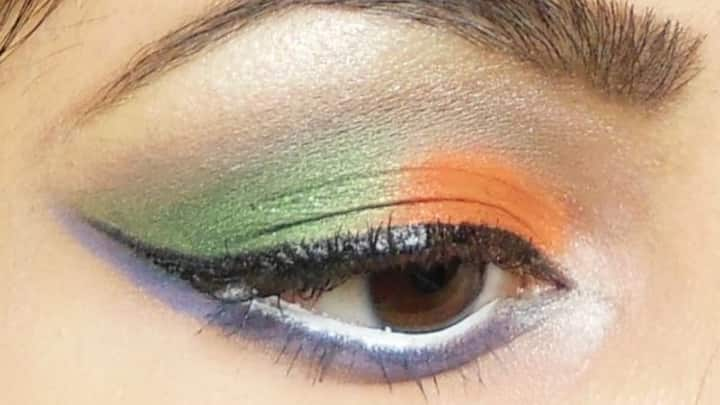 6. Colorful Winged Eyeliner – Create a wing-shaped eyeliner using green and orange hues. This modern take on the classic eyeliner adds a fun pop of color. For a more dramatic effect, extend the eyeliner a little further than usual and add a thin line of white between the green and orange to complete the tri-color theme. (Image source: Pinterest/beautyandmakeupmatters.com)