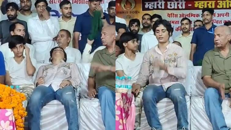 Vinesh Phogat Faints Exhausted Felicitation Ceremony In Balali Village Return From Paris Olympics 2024 Viral Video Vinesh Phogat Seemingly Faints Due To Exhaustion During Her Felicitation Ceremony After Paris Olympics Return | WATCH VIDEO