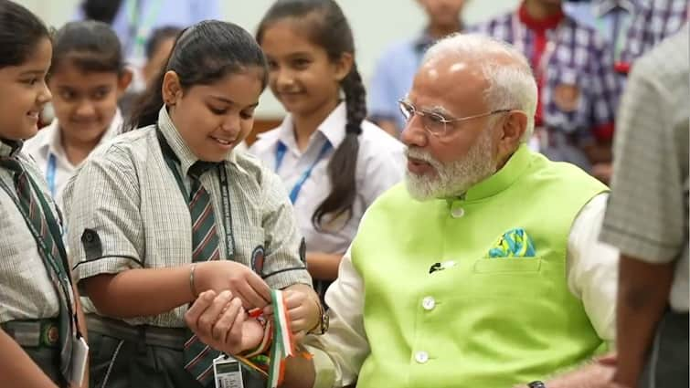 Raksha Bandhan 2024 School Students Tie Rakhi To PM Modi A Rakhi For PM: School Students Celebrate Rakshabandhan With Modi — Watch