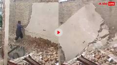 शख्स के ऊपर गिर गई हजार किलो वजनी दीवार, वीडियो देख कांप जाएगा कलेजा