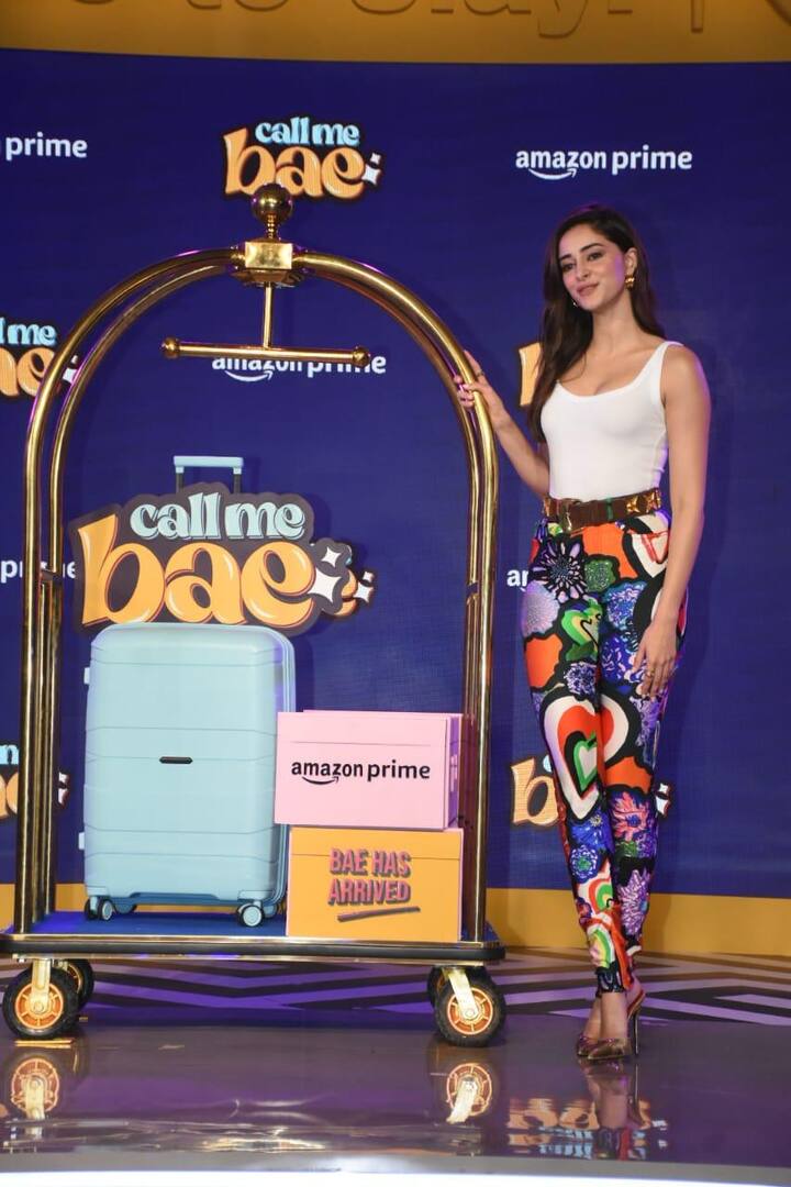 The protagonist Ananya Panday turned heads with her stylish look in a white bodycon tank top paired with floral printed colourful pants.