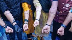 कोलकाता की घटना के खिलाफ विरोध में उतरे कानपुर के युवा, हाथों पर बनवाया 'जस्टिस' का टैटू