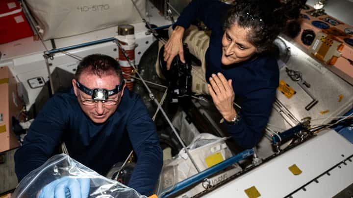 NASA astronauts Butch Wilmore and Sunita Williams, Boeing's Crew Flight Test Commander and Pilot, respectively, inspect safety hardware aboard the International Space Station | Photo: NASA