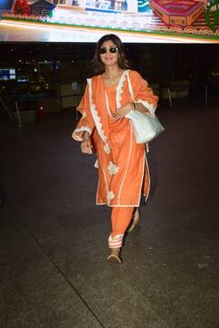 Shilpa Shetty Airport Look: आंखों पर चश्मा...ऑरेंज सूट, एयरपोर्ट पर देसी लुक में स्पॉट हुईं शिल्पा शेट्टी, देखिए खूबसूरत तस्वीरें