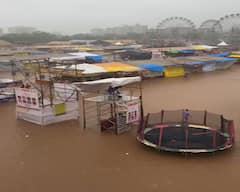 Rajkot Lok Mela: ધોધમાર વરસાદે રાજકોટનો લોકમેળો ધોઈ નાખ્યો, વેપારીઓ ચિંતામાં