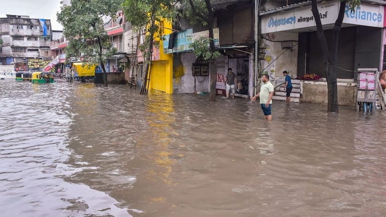 Gujarat Rains 3 Dead Flood In Major Area IMD Red Alert Still In Place Gujarat Rain Kills 7, Triggers Flood In Major Areas, IMD Red Alert Still In Place: Updates