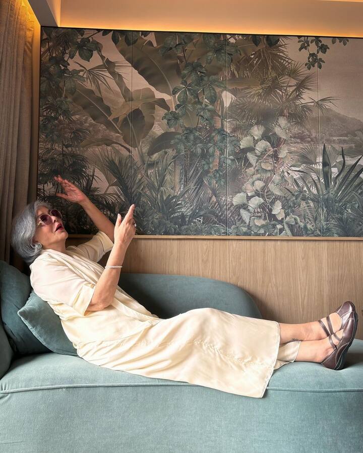 The first snap shows the ''Hare Rama Hare Krishna' fame actress wearing an off white outfit, and is relaxing on a couch.