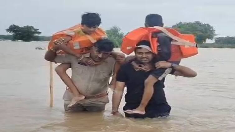 Ahmedabad: Dholka police  rescued 39 people trapped in flood અમદાવાદના ધોળકામાં પોલીસની પ્રશંસનીય કામગીરી, પૂરમાં ફસાયેલા 39 લોકોનું કર્યું રેસ્ક્યૂ