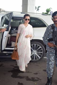 माथे पर बिंदी...आंखों पर चश्मा, एयरपोर्ट पर फिर साड़ी में दिखा कंगना रनौत का स्वैग लुक, देखें तस्वीरें