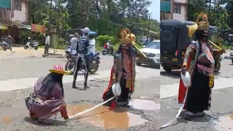 Yamaraja Leads Pothole Olympics Long Jump Competition On Udupi Road In Hilarious Protest WATCH 'Yamaraja' Hosts Long-Jump Contest In Karnataka To Solve Udupi Pothole Problem: WATCH