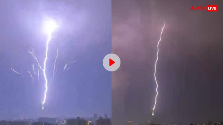 mecca clock tower lightning strike video viral on social media watch मक्का के क्लॉक टावर पर बिजली गिरने का खौफनाक वीडियो आया सामने, आप भी देखें ये अद्भुत नजारा