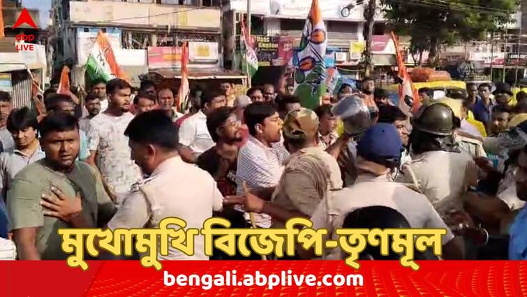 Bangla Bandh 2024 Scuffle between BJP and TMC supporters as they approached face to face at Malda BJP Bangla Bandh 2024: বনধের সমর্থন ও বিরোধিতার মিছিলে মুখোমুখি বিজেপি-তৃণমূল, মাঝে দাঁড়িয়ে পুলিশ ! যা ঘটল মালদায়...