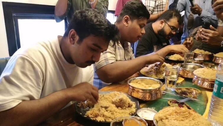 Coimbatore news restaurant announced a reward of one lakh for eating six biryanis - TNN 6 பிரியாணி சாப்பிட்டால் ரூ.1 லட்சம் பரிசு... குவிந்த மக்கள் - எங்கு தெரியுமா?