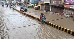 IN Pics: घाटों की नगरी काशी में दरिया बनी सड़कें, लोगों को आवागमन में हो रही परेशानियां, देखें तस्वीरें