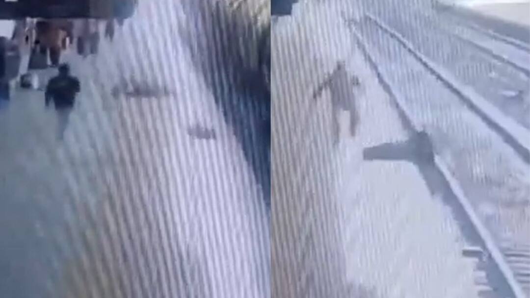 Viral Video: ట్రాక్ దాటుతుండగానే దూసుకొచ్చిన ట్రైన్, మధ్యలో ఇరుక్కుపోయిన మహిళ - అంతలో ఏం జరిగిందంటే? Woman Hit By Train While Crossing Railway Track Saved By Cop Viral Video: ట్రాక్ దాటుతుండగానే దూసుకొచ్చిన ట్రైన్, మధ్యలో ఇరుక్కుపోయిన మహిళ - అంతలో ఏం జరిగిందంటే?