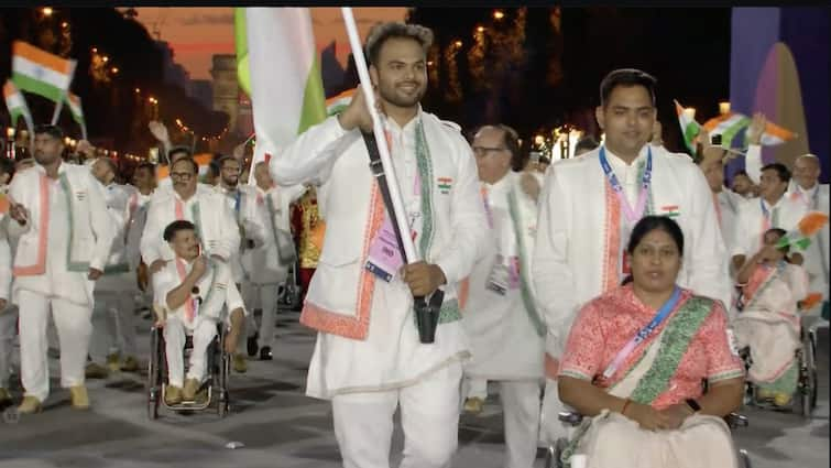 Paris Paralympics 2024 Opening Ceremony Sumit Antil Bhagyashree Jadhav Wave Indian Tricolour In Parade Of Nations | WATCH VIDEO Paris Paralympics 2024 Opening Ceremony: Sumit Antil, Bhagyashree Jadhav Lead India In Parade Of Nations | WATCH VIDEO