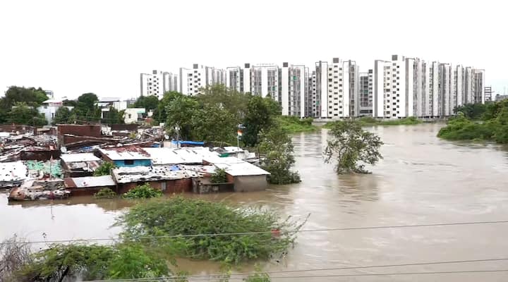 Houses partially submerged following heavy rainfall, at the Akota stadium area in Vadodara on Thursday, Aug 29, 2024. (Source: PTI)